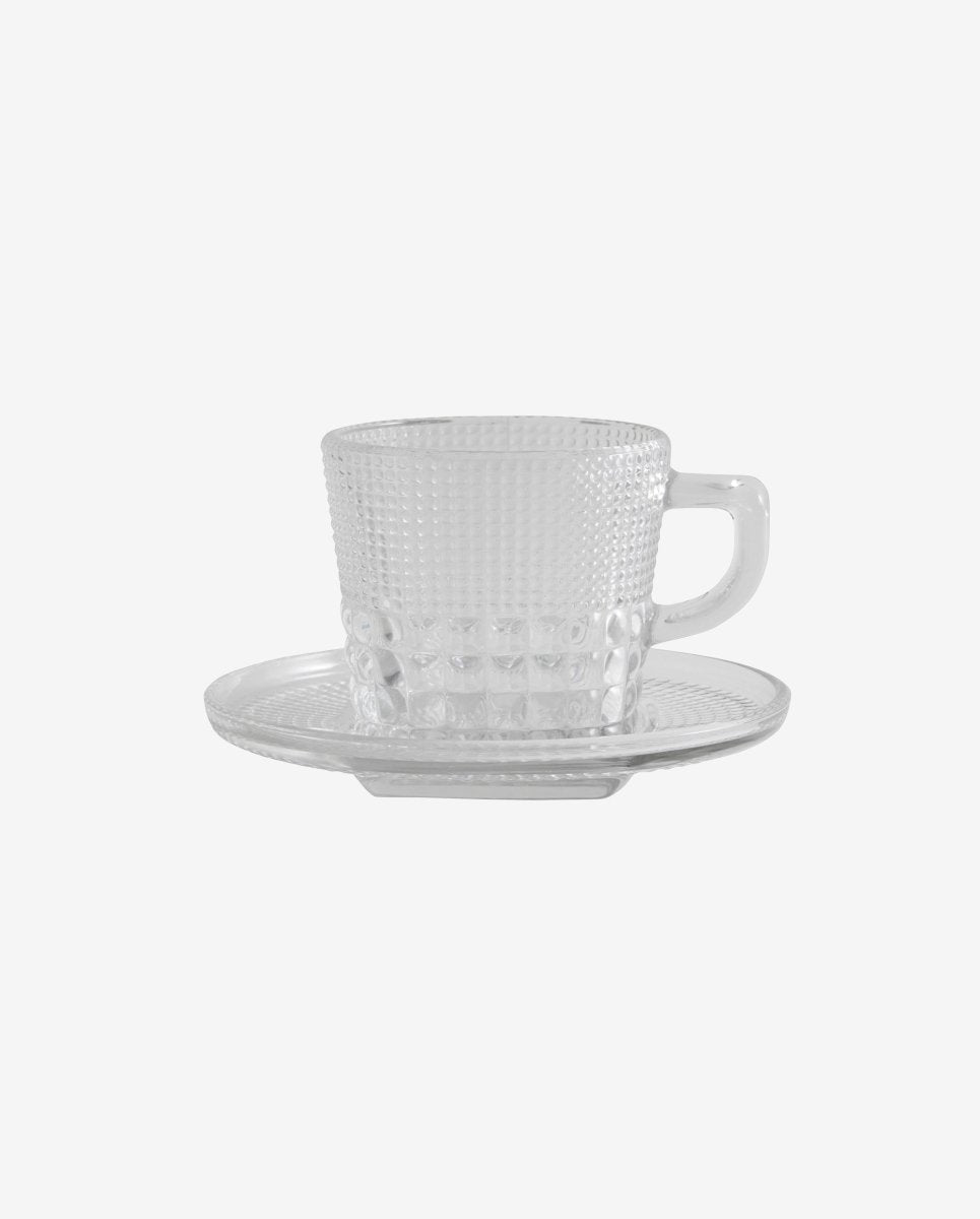 Cup in patterned glass with saucer