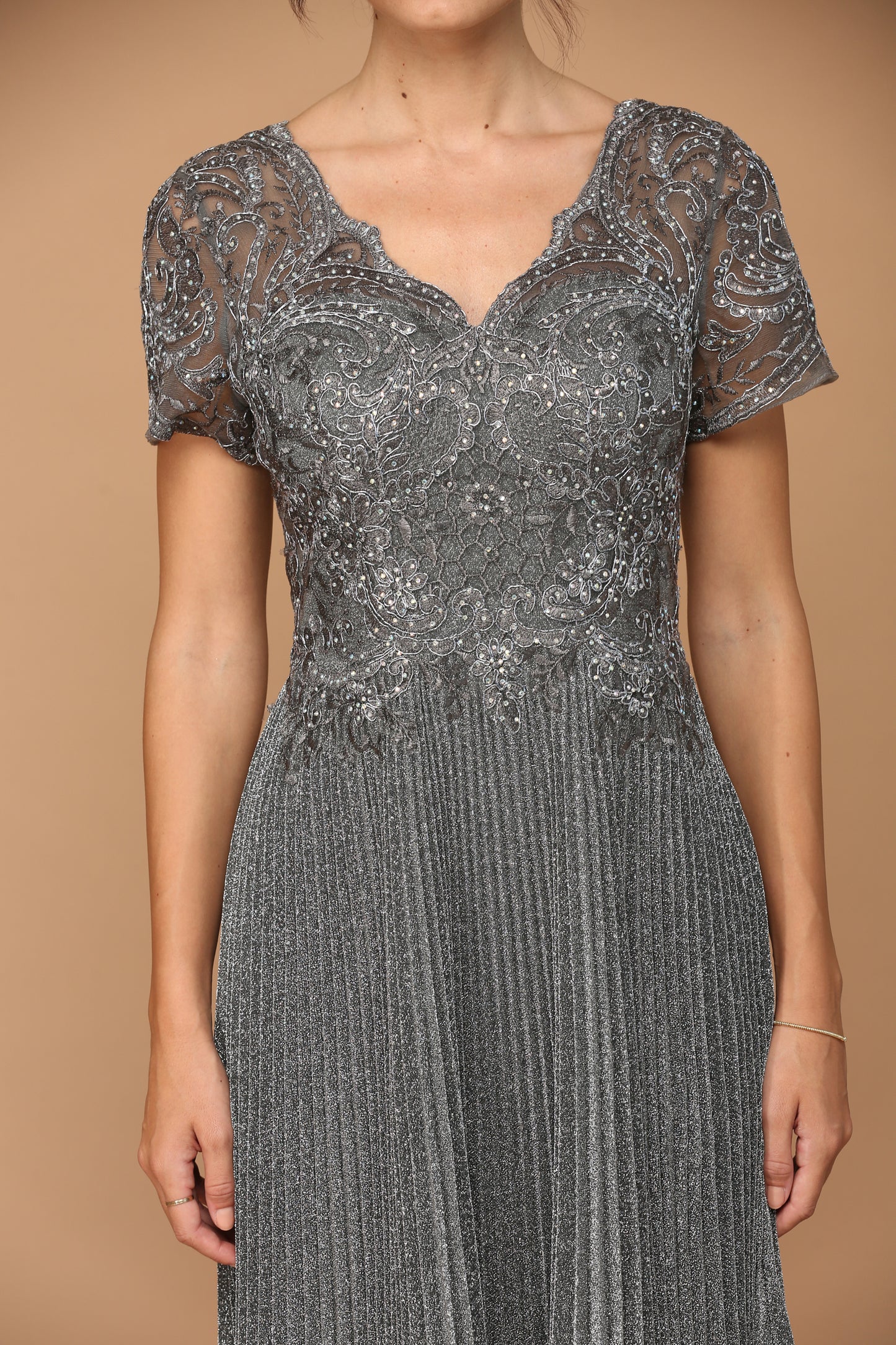 Silver colored party dress with short sleeves